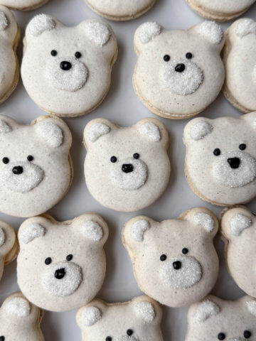 polar bear macarons on a white plate