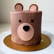 a Teddy Bear Cake on a gold cardboard cake board