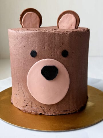 a Teddy Bear Cake on a gold cardboard cake board