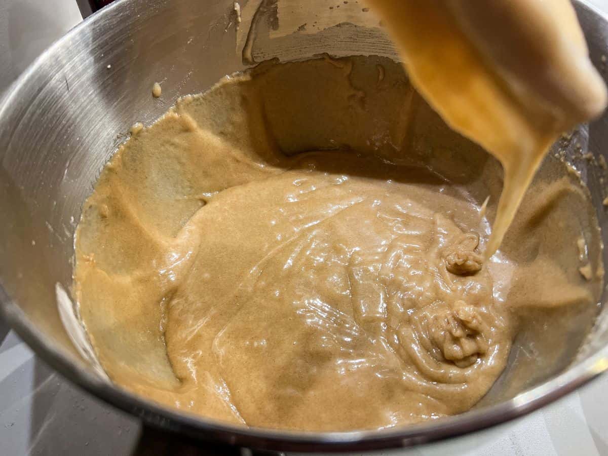 cake batter in the bowl of a stand mixer