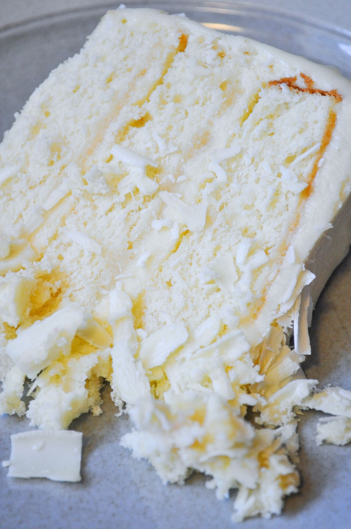 a slice of white chocolate amaretto cake on a plate