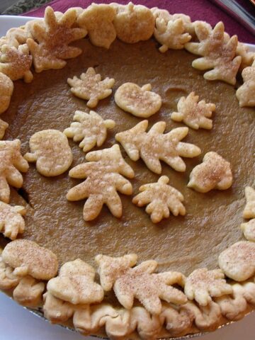 a Rich Pumpkin Pie on a square white plate