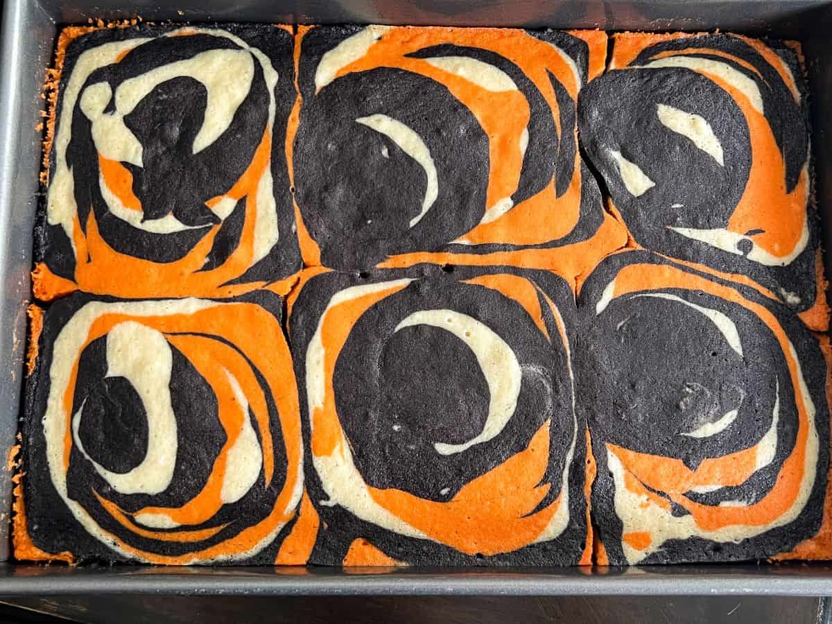 a baked tiger striped cake in a rectangular pan