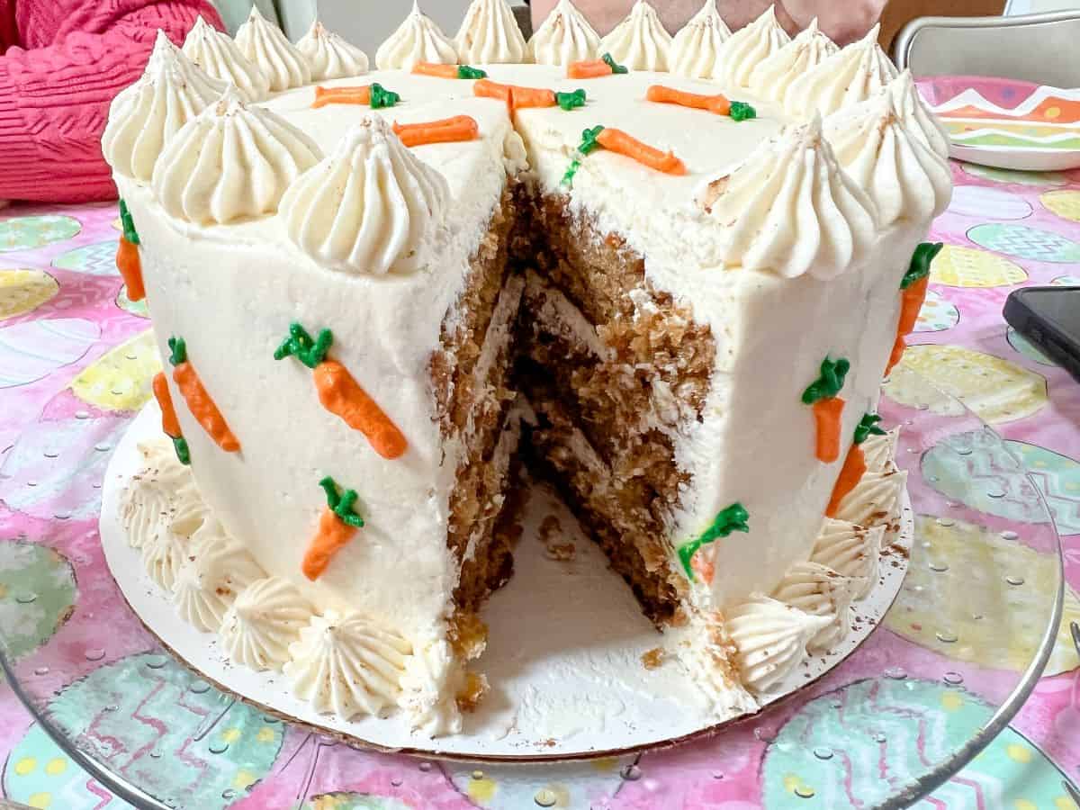 a carrot cake with a slice removed