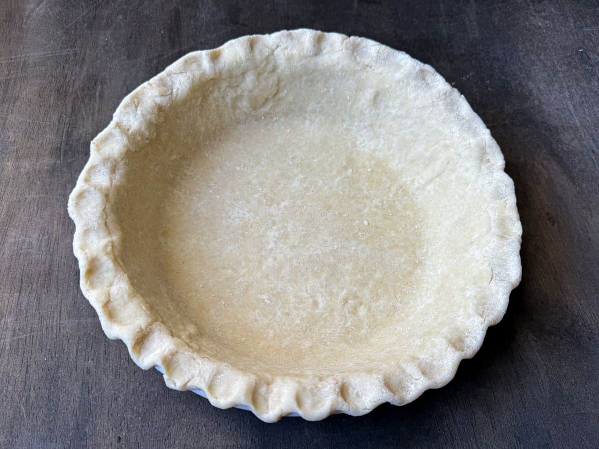 pie dough fitted into a pie plate