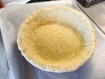 a single crust pie that has been partially baked