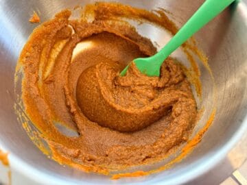 pumpkin filling being mixed in a bowl