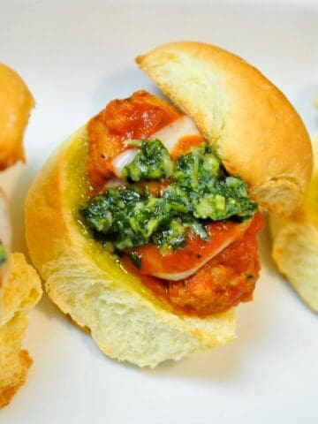 Chicken Parmesan Meatball Sliders on a white plate