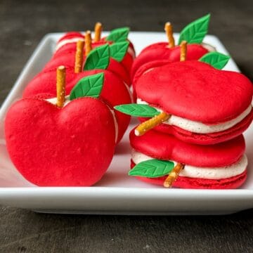 Nut Free Caramel Apple Cider Macarons shaped like apples on a white plate