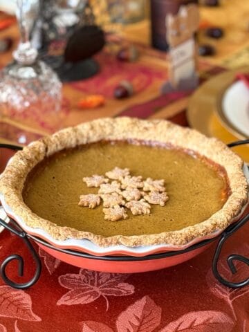 Rich Pumpkin Pie on a Thanksgiving table