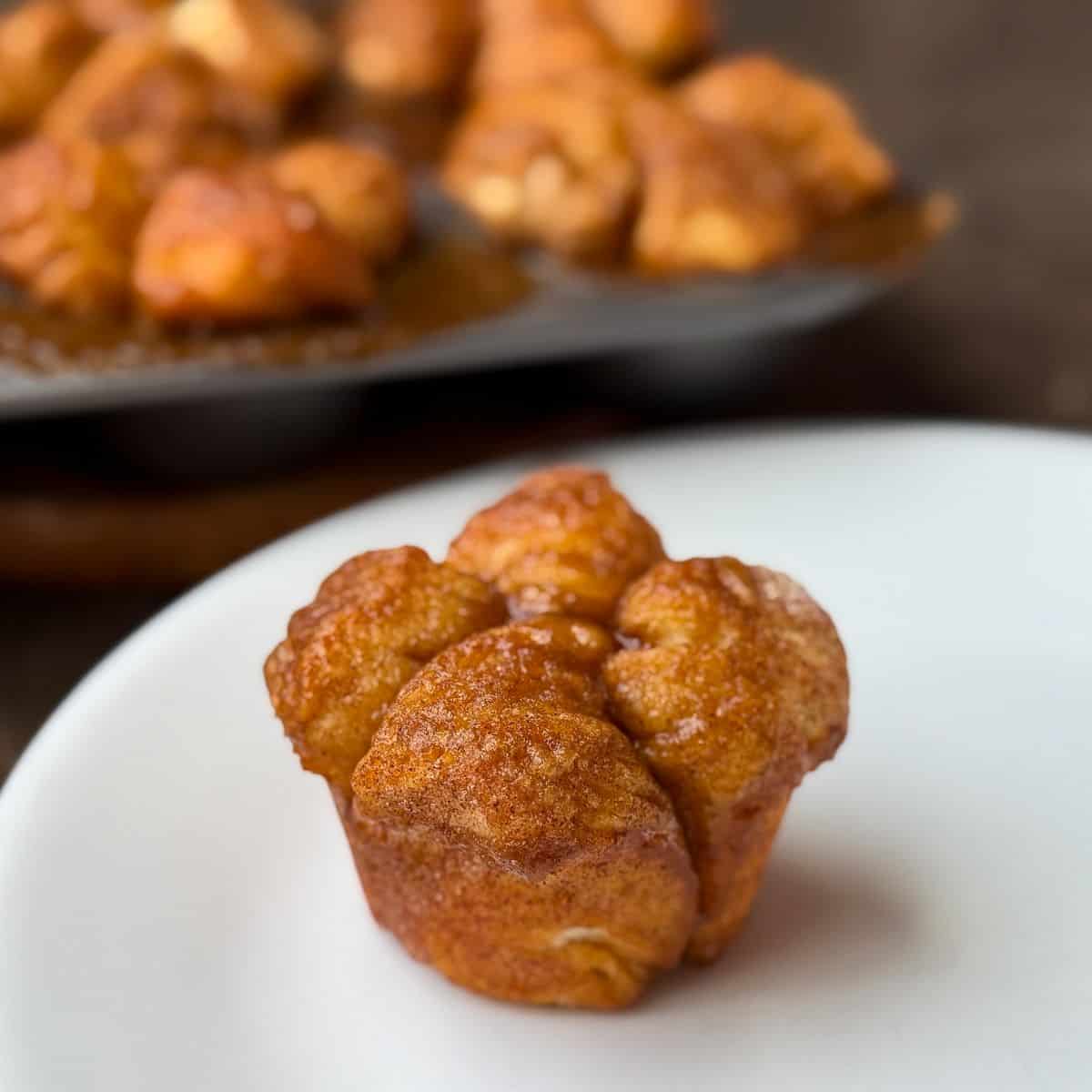 a monkey bread muffin on a white plate