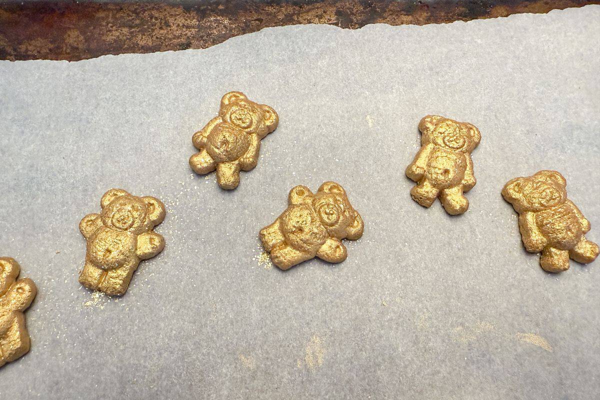 teddy grahams that have been painted with gold luster dust