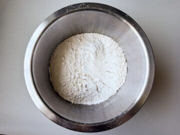 macaron shell dry ingredients in a metal bowl