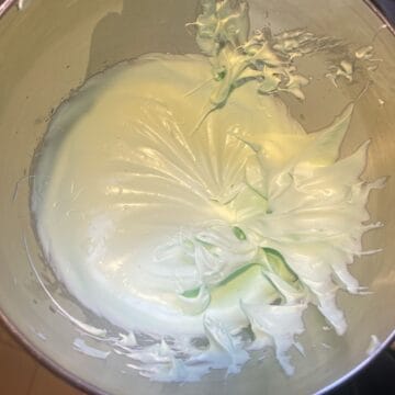 meringue for French macarons in a mixing bowl