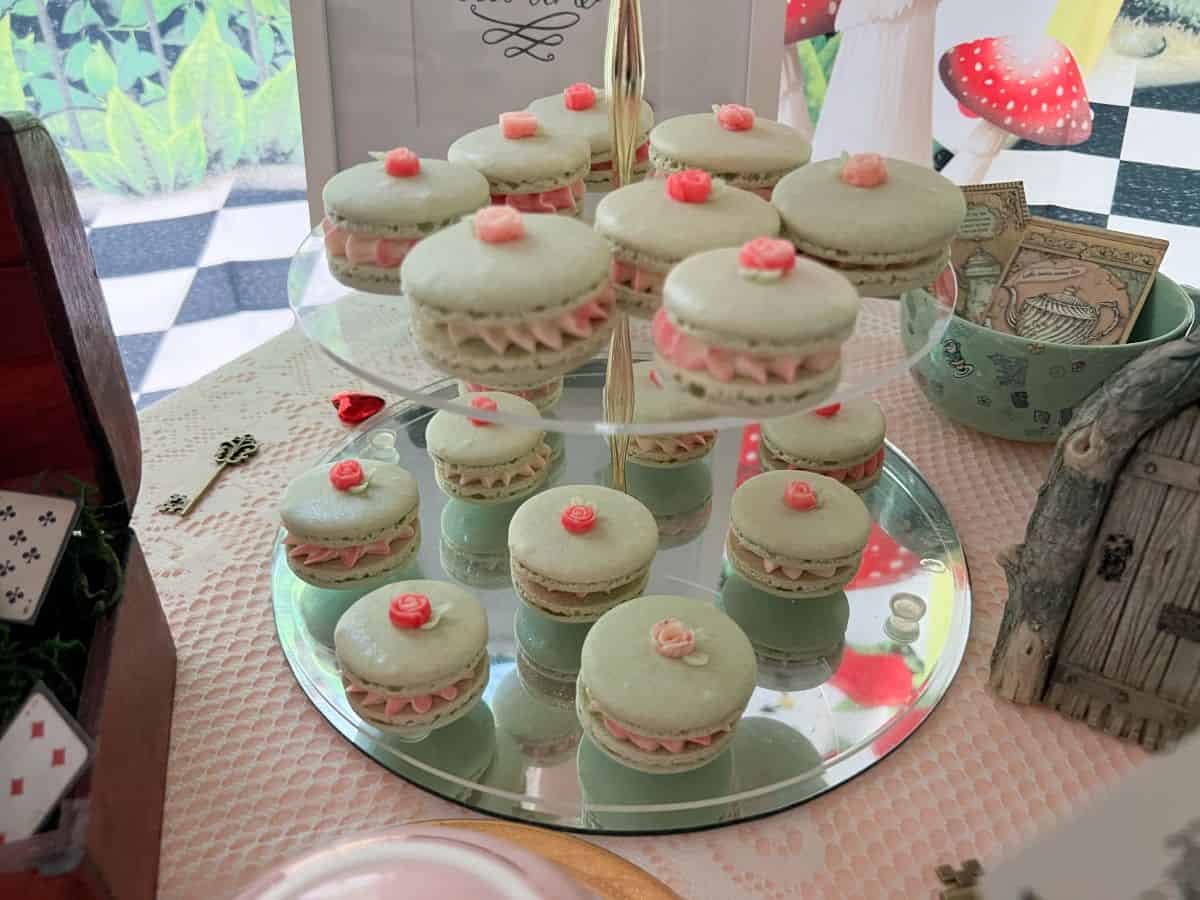 mini rose macarons on a 3-tiered server