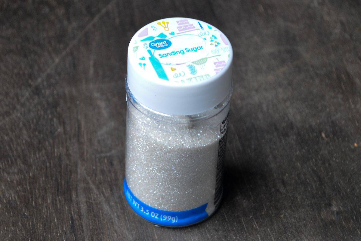 a container of white sanding sugar