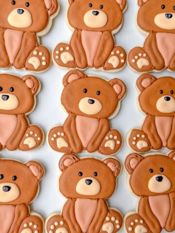 Teddy Bear Cookies with Royal Icing on a white plate