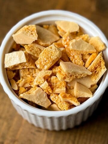 a white ramekin filled with Coffee Crunch Honeycomb Candy