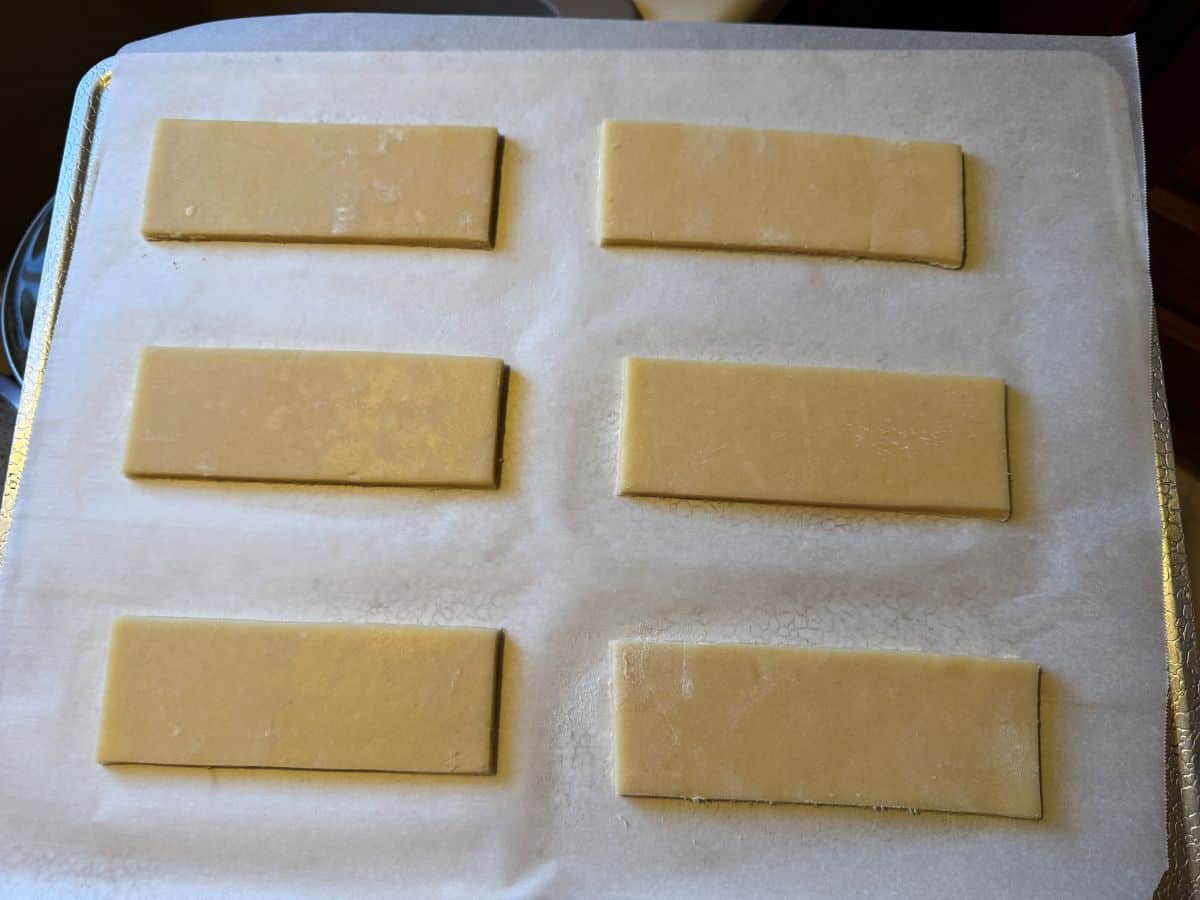6 rectangular cookies on a parchment lined cookie sheet