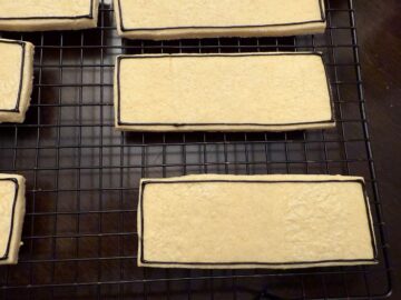 sugar cookies outlined with black royal icing