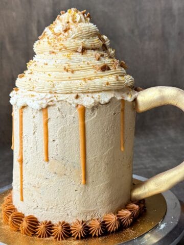Harry Potter Butterbeer Cake shaped like a mug of butterbeer