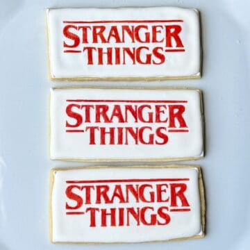 three Stranger Things Cookies on a white plate