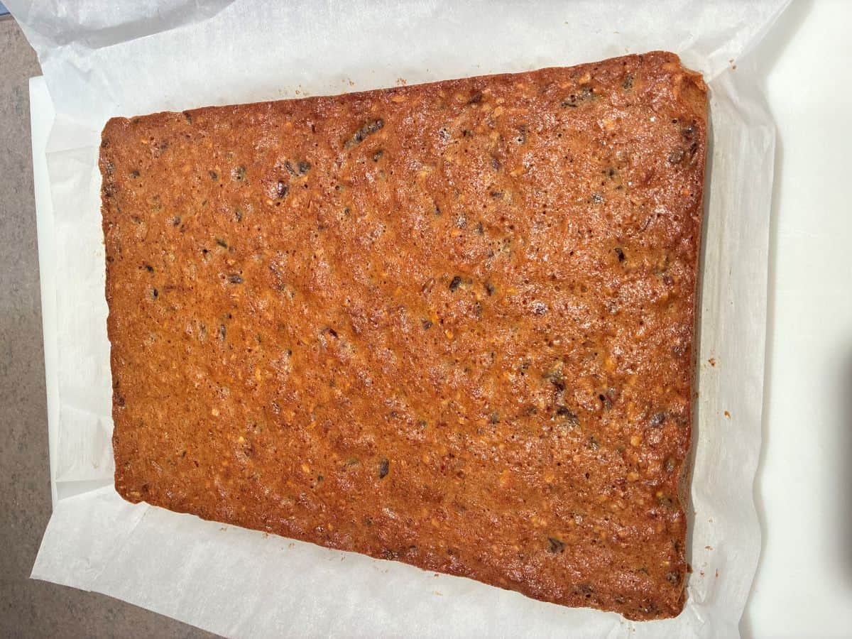 Date Bars baked and turned out onto a piece of parchment paper