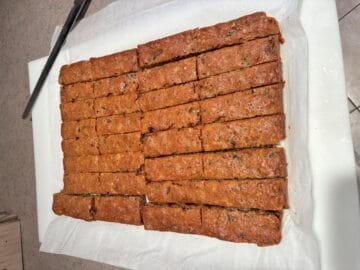 Date Bars cut into bars before being rolled in powdered sugar