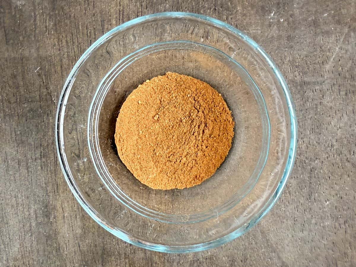 fall spices mixed together in a small glass bowl