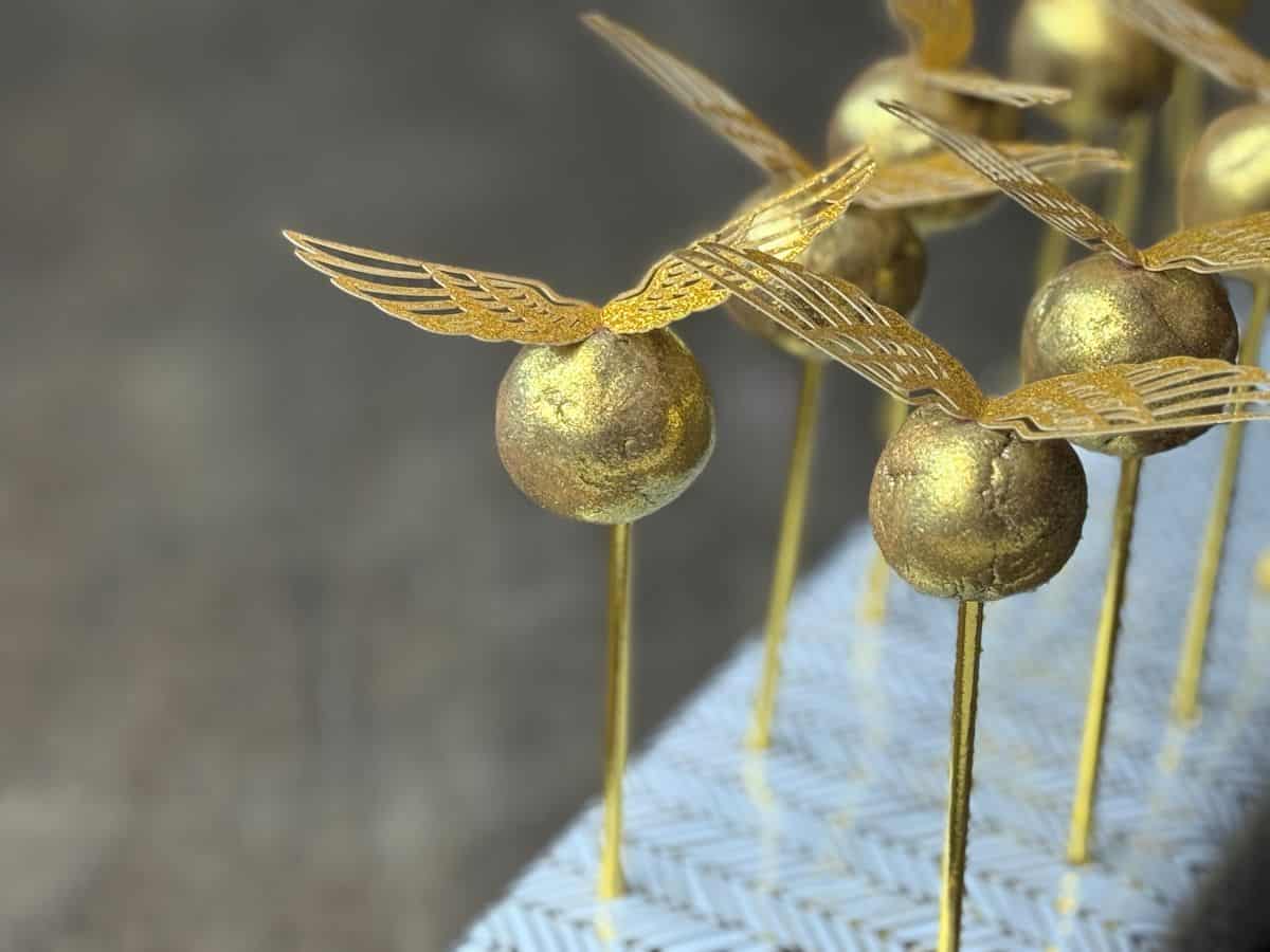 a close up of Golden Snitch Brigadeiros