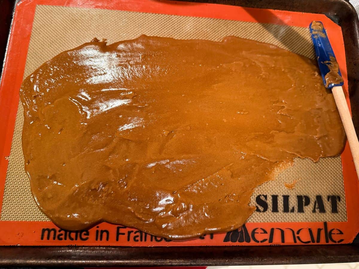 toffee freshly poured onto a silpat lined baking sheet