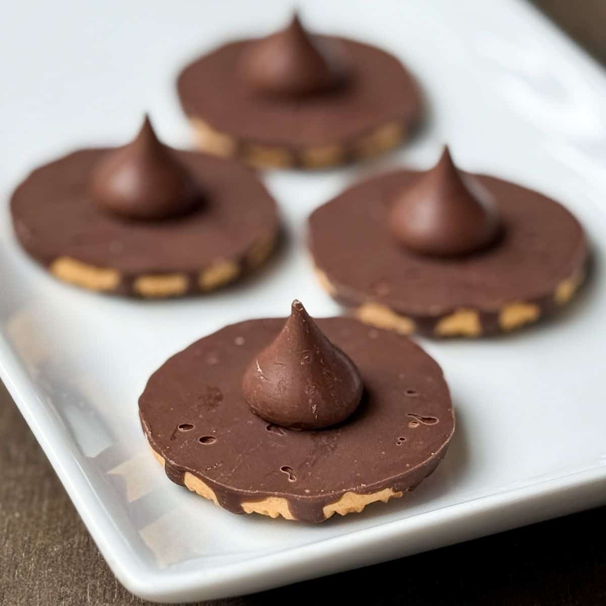 Easy Chocolate Wizard Hat Cookies on a white plate