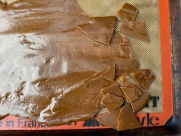 toffee on a silpat that has started to be broken into pieces