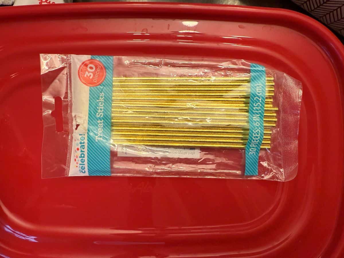 gold candy sticks in a bag