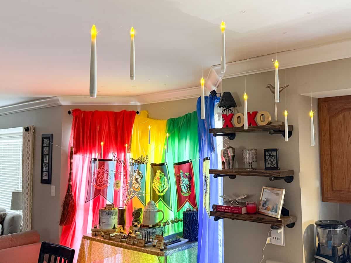 floating candles hanging from a kitchen ceiling
