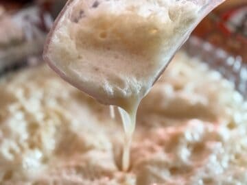 Butterbeer punch being poured out of a ladle