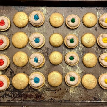 Nut Free Butterbeer Sorting Hat Macarons on a baking sheet