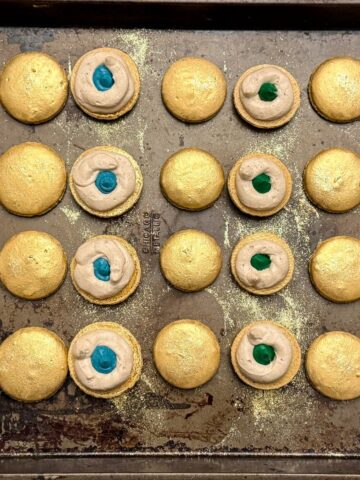 Nut Free Butterbeer Sorting Hat Macarons on a baking sheet