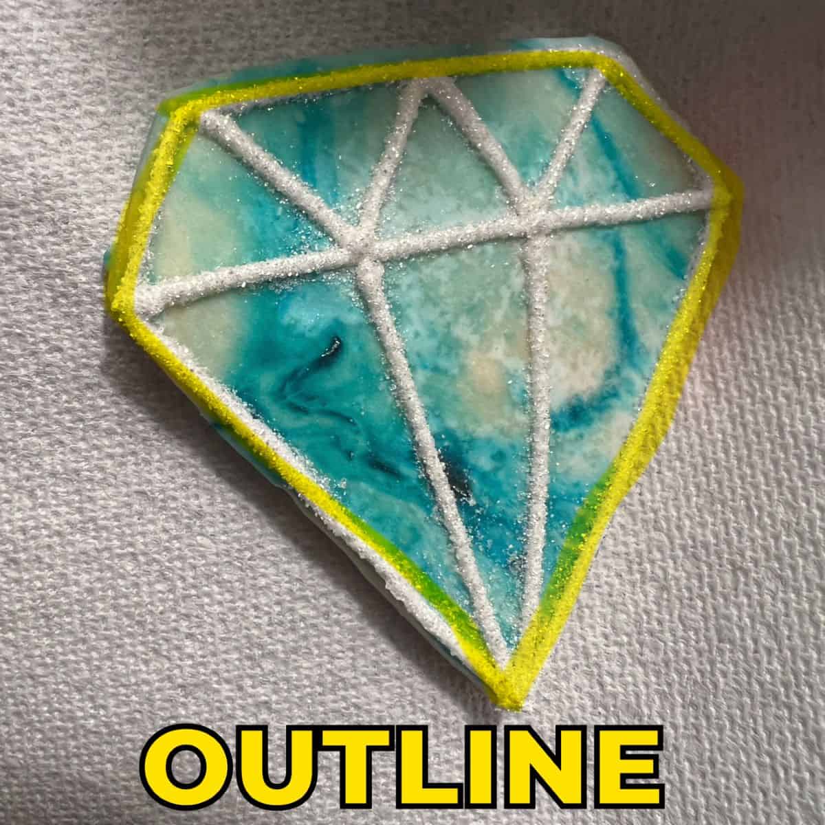 a Diamond Gem Cookie with a highlighter tracing the outline of the cookie