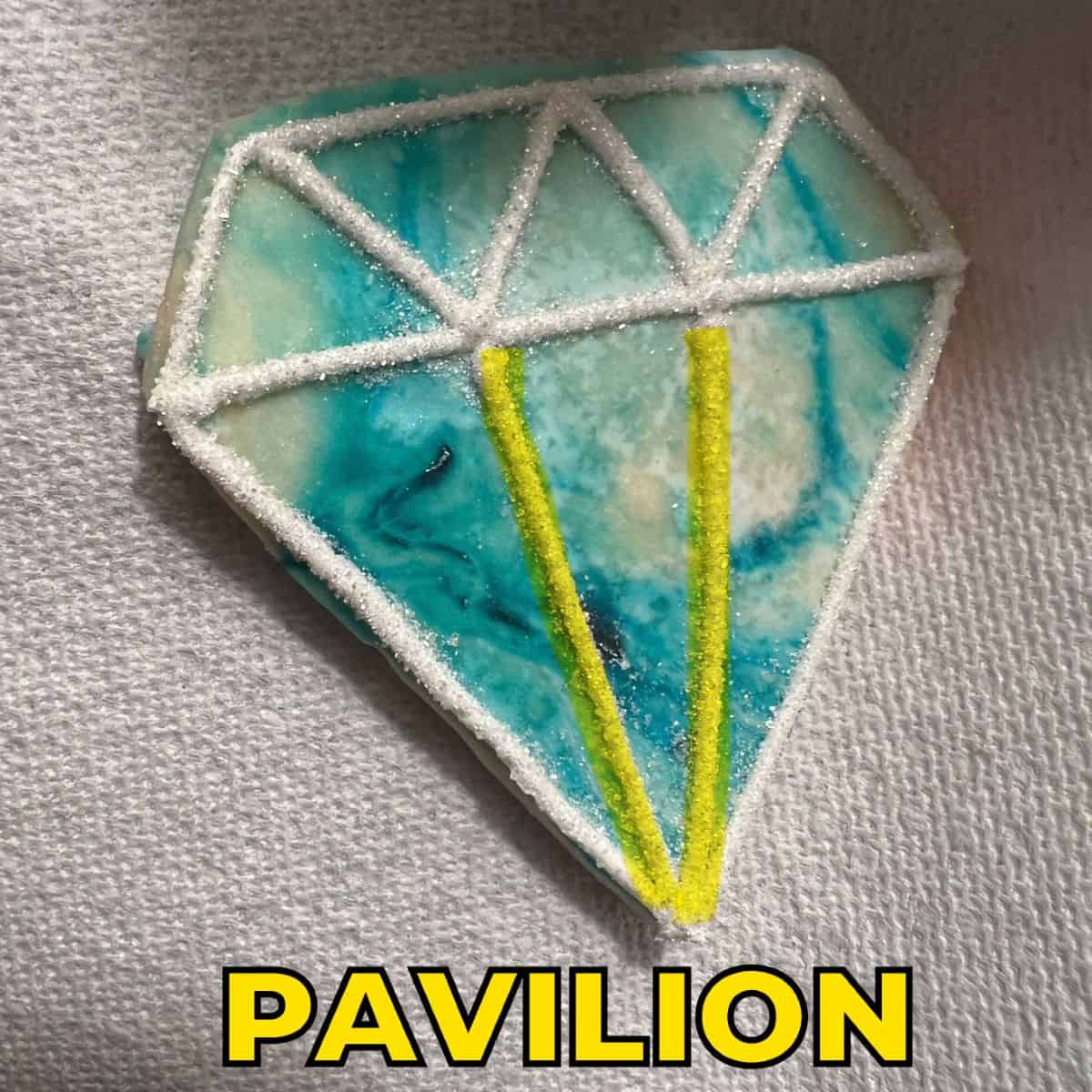 a Diamond Gem Cookie with a highlighter tracing two lines in the pavilion section of the diamond to create the facets